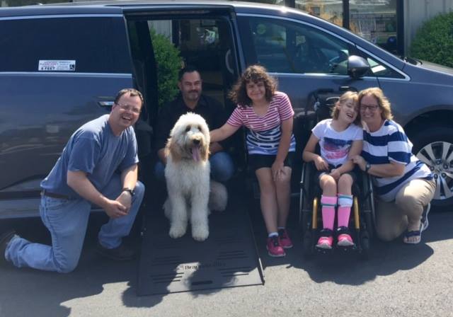Ava, Amanda, Ann & Ed receiving their new  BraunAbility Honda Odyssey Wheelchair Van